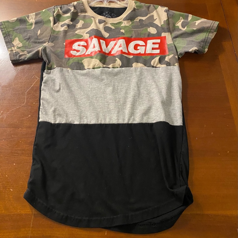 Bailey Apparel East west savage shirt is junior size Small.